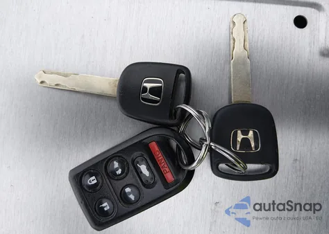 2010 Honda Odyssey Ex-L z USA, uszkodzony, nr VIN 5FNRL3H70AB107862